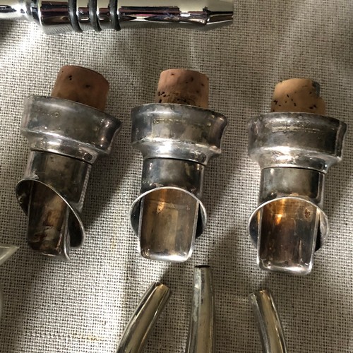 1596 - Silver plated and chrome, Wine bottle spouts, measures and stoppers