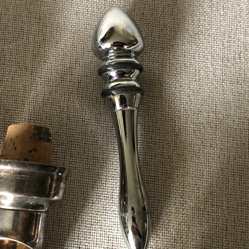 1596 - Silver plated and chrome, Wine bottle spouts, measures and stoppers