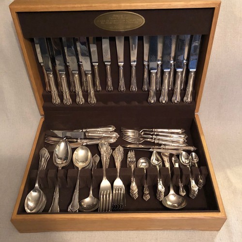 1597 - Comprehensive Walker and Hall silver plated cutlery set boxed in a solid blond Oak case