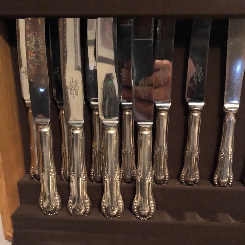 1597 - Comprehensive Walker and Hall silver plated cutlery set boxed in a solid blond Oak case