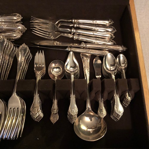 1597 - Comprehensive Walker and Hall silver plated cutlery set boxed in a solid blond Oak case