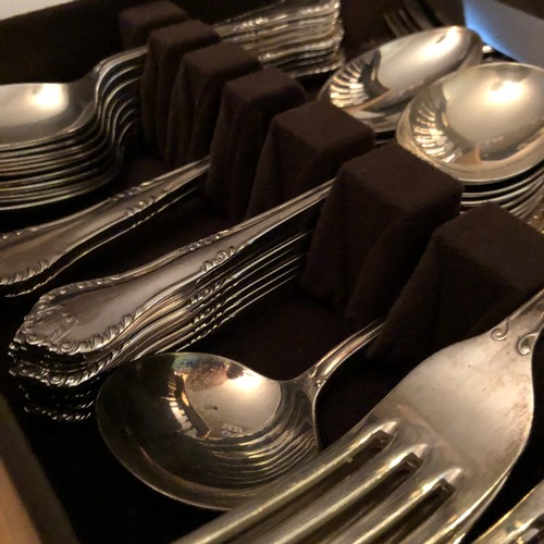 1597 - Comprehensive Walker and Hall silver plated cutlery set boxed in a solid blond Oak case