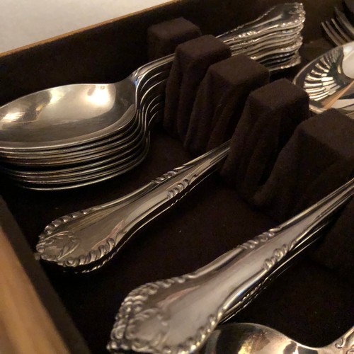 1597 - Comprehensive Walker and Hall silver plated cutlery set boxed in a solid blond Oak case