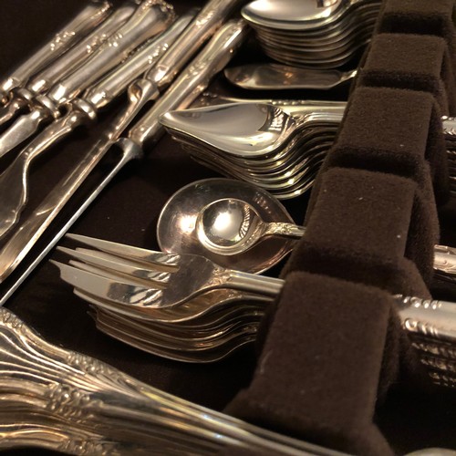 1597 - Comprehensive Walker and Hall silver plated cutlery set boxed in a solid blond Oak case
