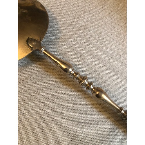 1602 - A large 19th century silver serving spoon, likely United Arab Emirates, marked in Arabic and tested ... 