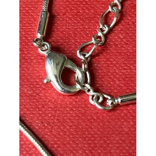 1690 - White metal pendant and chain