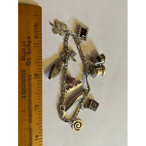 1784 - Silver Charm bracelet with silver charms 17.9g