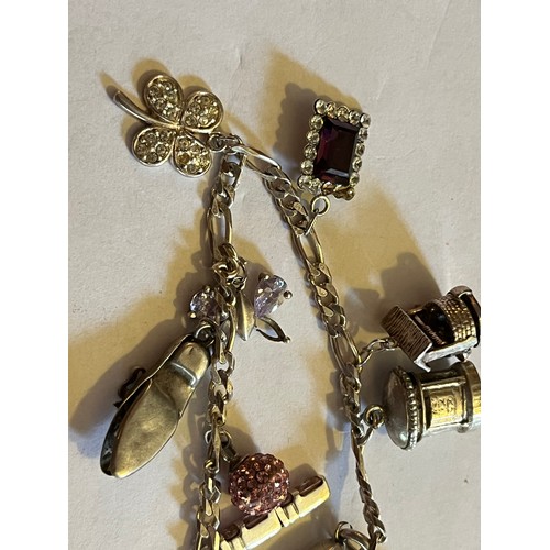 1784 - Silver Charm bracelet with silver charms 17.9g