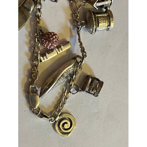 1784 - Silver Charm bracelet with silver charms 17.9g