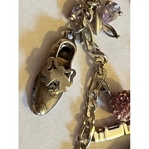 1784 - Silver Charm bracelet with silver charms 17.9g
