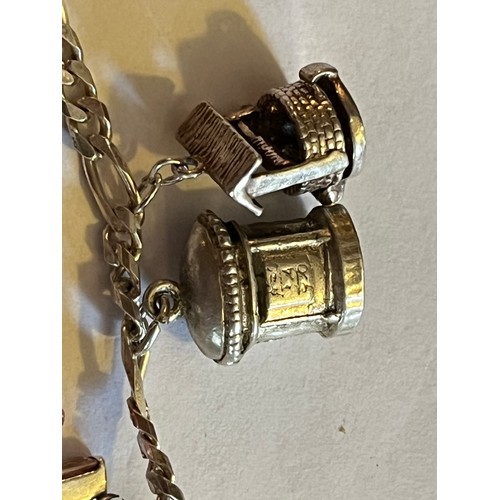 1784 - Silver Charm bracelet with silver charms 17.9g