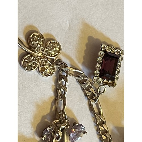 1784 - Silver Charm bracelet with silver charms 17.9g