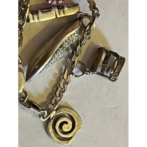 1784 - Silver Charm bracelet with silver charms 17.9g