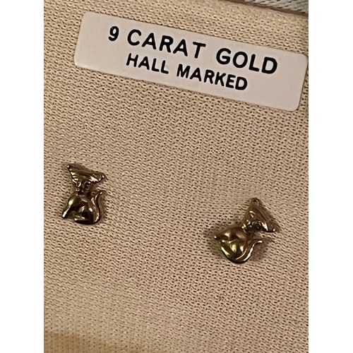 1856 - A pair of 9 ct gold cat motif  hallmarked earrings with plastic clips. Birmingham assay office