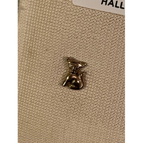 1856 - A pair of 9 ct gold cat motif  hallmarked earrings with plastic clips. Birmingham assay office