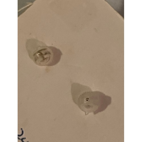 1856 - A pair of 9 ct gold cat motif  hallmarked earrings with plastic clips. Birmingham assay office