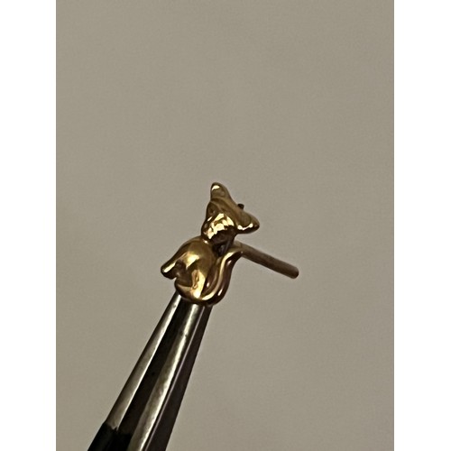 1856 - A pair of 9 ct gold cat motif  hallmarked earrings with plastic clips. Birmingham assay office