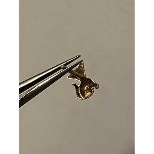 1856 - A pair of 9 ct gold cat motif  hallmarked earrings with plastic clips. Birmingham assay office