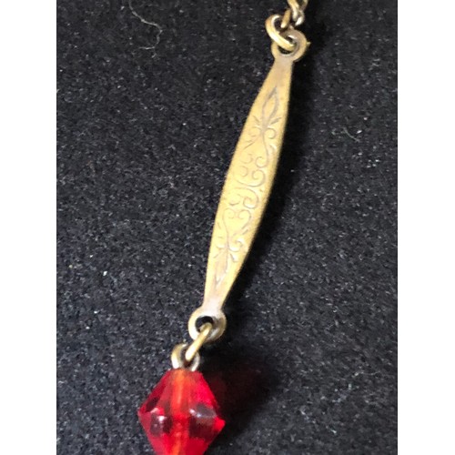 1871 - 1920's Edwardian silver plated chain with a bright vermilion red crystal paste briolette suspended f... 