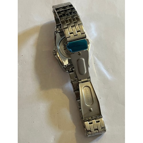 1888 - Duncougar automatic watch. Never worn with plastic covers on face and strap. Stainless steel