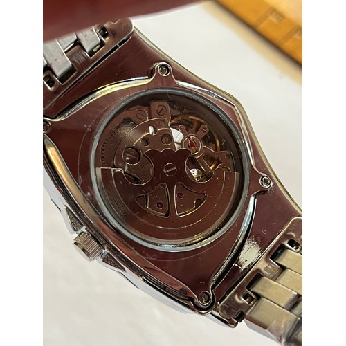1888 - Duncougar automatic watch. Never worn with plastic covers on face and strap. Stainless steel