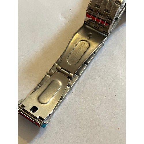 1888 - Duncougar automatic watch. Never worn with plastic covers on face and strap. Stainless steel