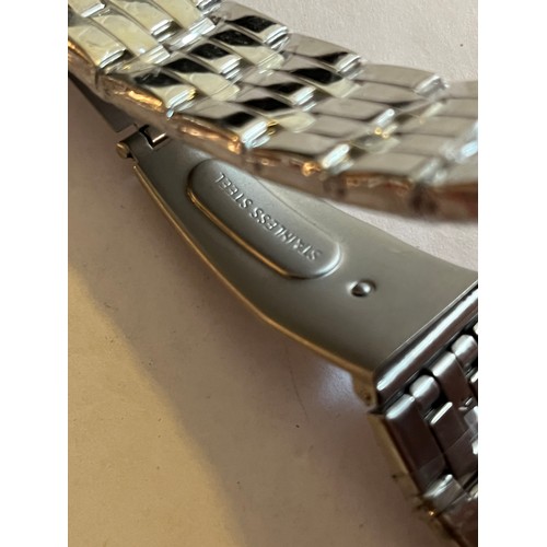 1888 - Duncougar automatic watch. Never worn with plastic covers on face and strap. Stainless steel