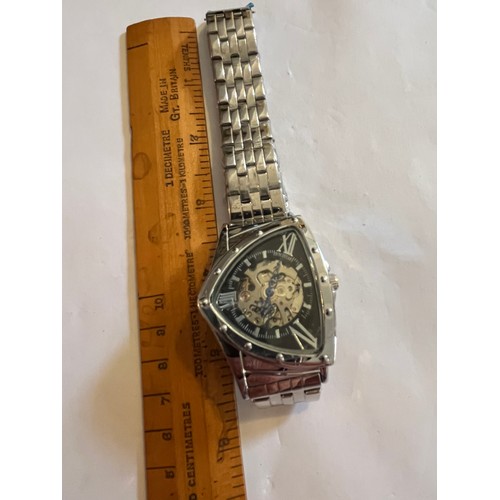 1888 - Duncougar automatic watch. Never worn with plastic covers on face and strap. Stainless steel