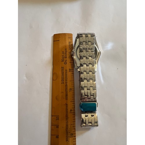 1888 - Duncougar automatic watch. Never worn with plastic covers on face and strap. Stainless steel