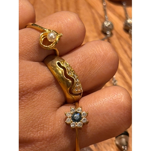 56 - Three costume rings