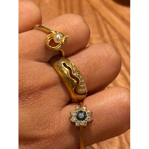 56 - Three costume rings