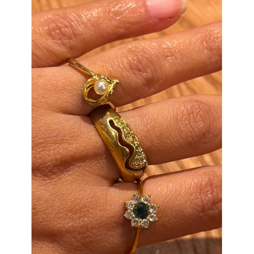 56 - Three costume rings