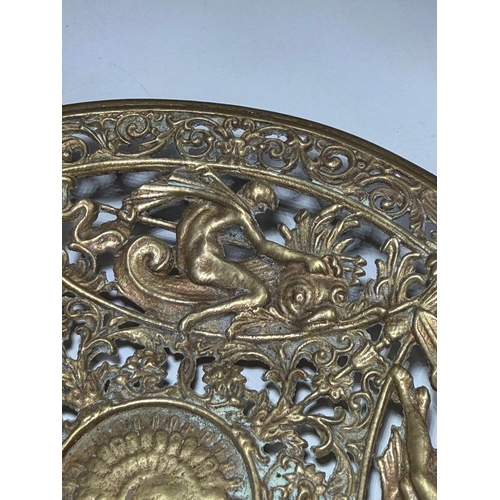 Intercut brass plack with mythological scene galleried design