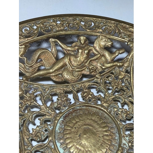 Intercut brass plack with mythological scene galleried design