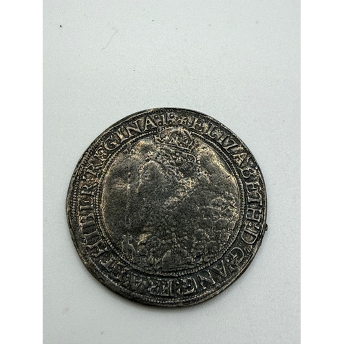 232 - Novelty coin. A copy reproduction of an Elizabeth I crown or shilling