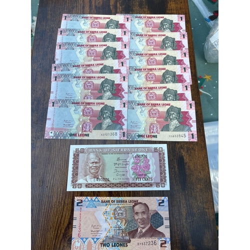 1 - Sierra Leone Banknote Collection – 14 Notes (1 Leone, 2 Leones & 50 Cents) Group of fourteen Bank of... 