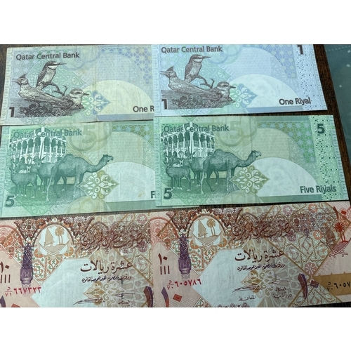 115 - Collection of Qatar banknotes comprising 1, 5 and 10 Riyal denominations, including duplicate exampl... 