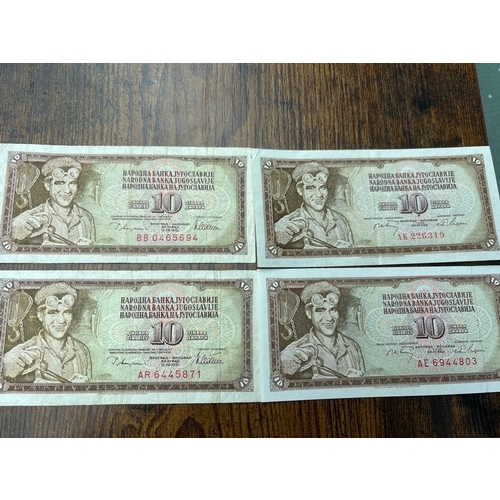 117 - Collection of 4 Yugoslavian 10 Dinara banknotes featuring the classic industrial worker design. A ni... 