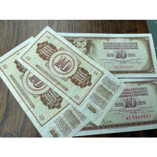 117 - Collection of 4 Yugoslavian 10 Dinara banknotes featuring the classic industrial worker design. A ni... 