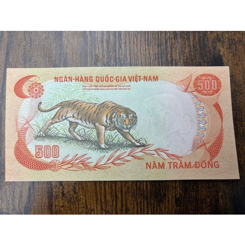 118 - Small collection of 5 Vietnam banknotes including the popular tiger design 500 Dong note, along with... 