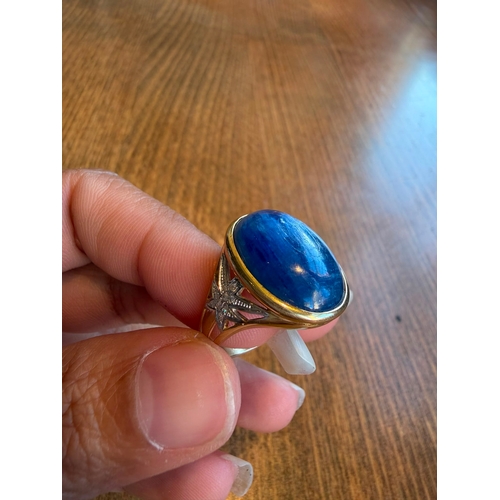 5 - A large 10ct sapphire like cabachon gemstone diamond ring 14 k gold Size- approx N