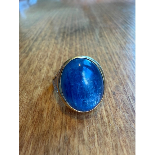 5 - A large 10ct sapphire like cabachon gemstone diamond ring 14 k gold Size- approx N