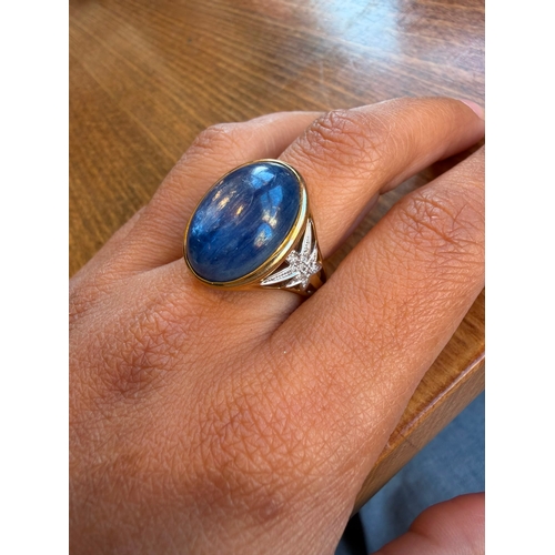 5 - A large 10ct sapphire like cabachon gemstone diamond ring 14 k gold Size- approx N