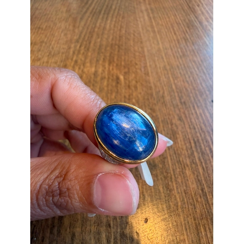 5 - A large 10ct sapphire like cabachon gemstone diamond ring 14 k gold Size- approx N