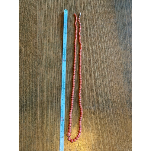12 - A natural graduated momo pink colour antique coral necklace with 9ct gold clasp just need string on ... 