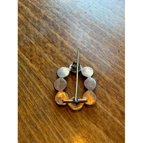 22 - A natural carved coral georgian brooch silver on gold one coral missing