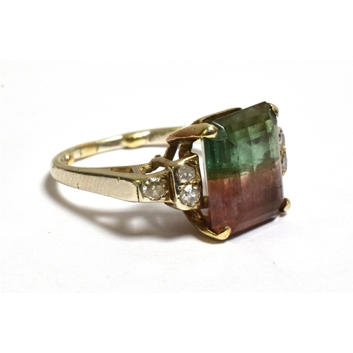 11 - A WATERMELON TOURMALINE & DIAMOND RING Mounted in 18ct gold (tests as), claw set with an octagonal s... 