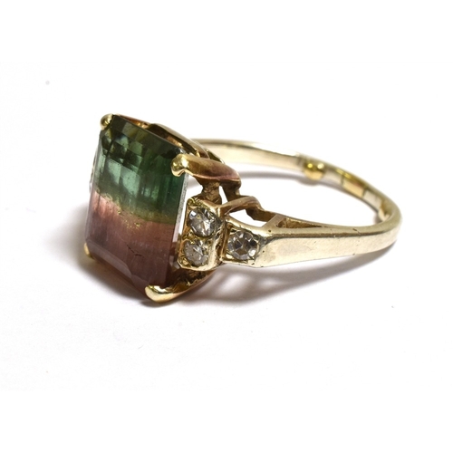 11 - A WATERMELON TOURMALINE & DIAMOND RING Mounted in 18ct gold (tests as), claw set with an octagonal s... 