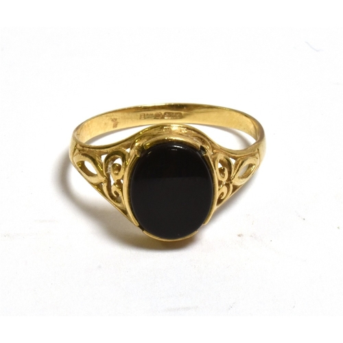 51 - THREE 9CT GOLD RINGS One set with an oval shell cameo, one with an oval onyx tablet and filigree wor... 