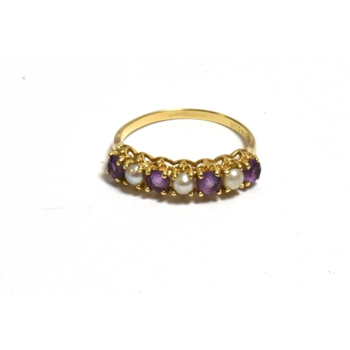 52 - THREE 9CT GOLD GEM SET RINGS To include; a navette shaped cluster set with round rubies and single c... 